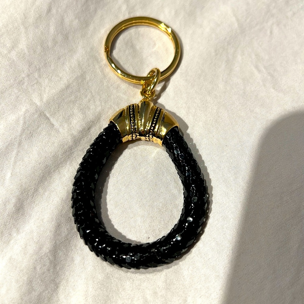 Vintage whiting and Davis keychain. Never used. Black with gold.